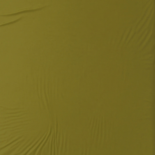 A close-up of olive green sheet with a soft, slightly wrinkled texture.