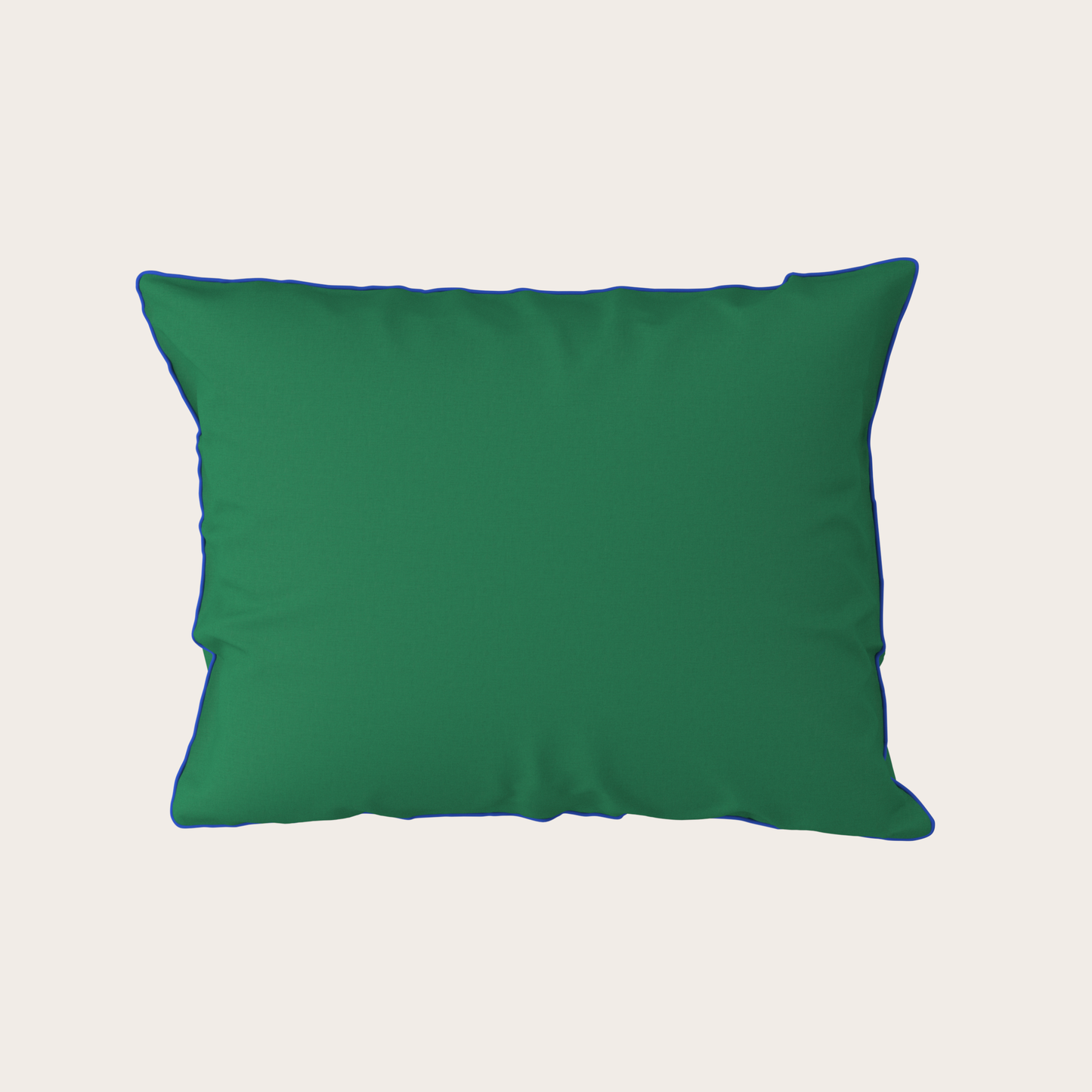Green pillow on a light gray background