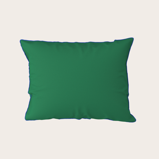 Green pillow on a light gray background