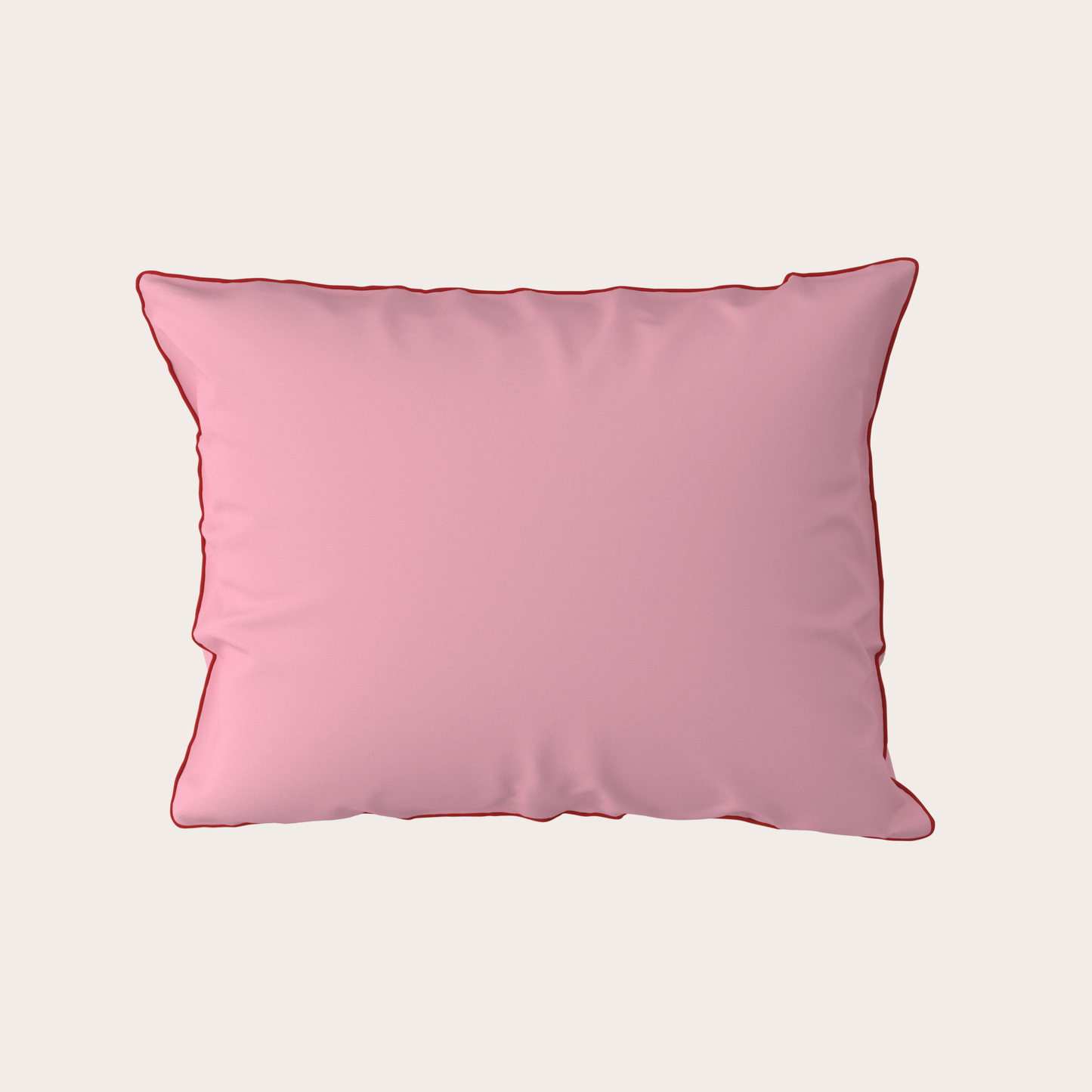 Pink pillow on a light beige background