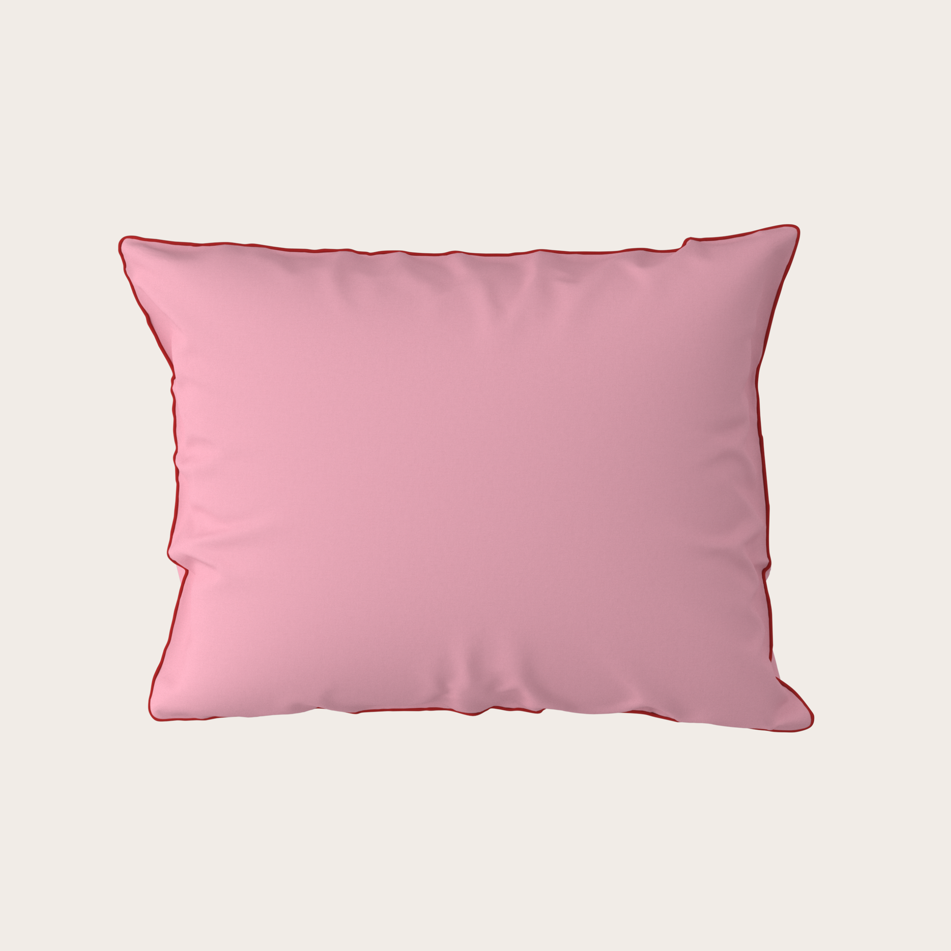 Pink pillow on a light beige background