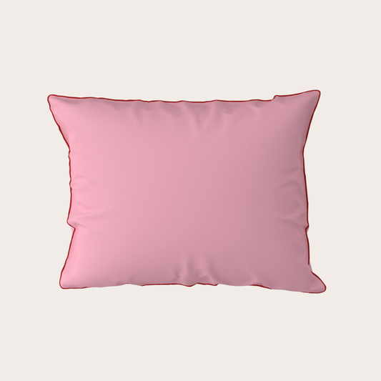 Pink pillow on a light beige background